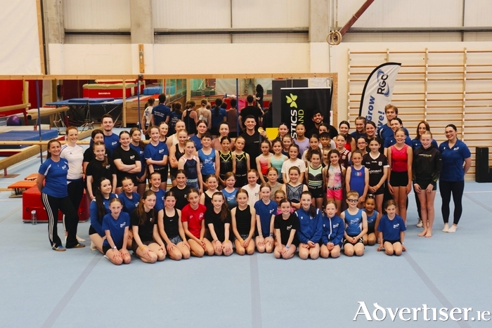 Olympic gold medalist Rhys McClenaghan with the lucky gymnasts at Renmore Gymnastics Club.