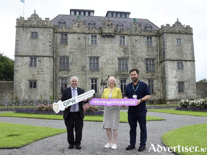Minister Kevin ‘Boxer’ Moran; Martina Moloney, Chair of The Heritage Council; and James Heenan, Head Guide Portumna Castle