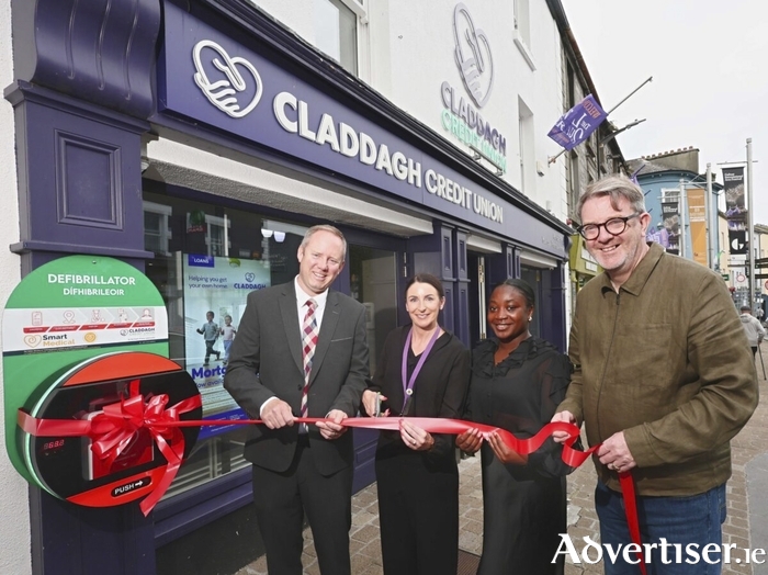 At the unveiling of the Automated External Defibrillator (AED) at Claddagh Credit Union’s Mainguard Street Branch on Monday were ( l-r) Ted Coyle, Deputy CEO of Claddagh Credit Union with staff Sinead Joyce and Faoshyat Azeez along with Cllr Neil McNelis, Green Hearts Medical. Photo: Mike Shaughnessy