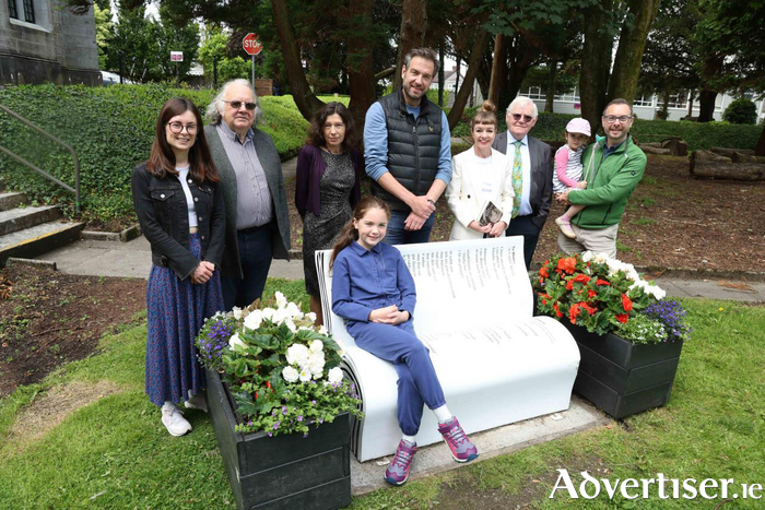 A group from University of Galway and the Galway Poetry Trail came together to officially dedicate the bench to Caitlín Maude in the company of her son and granddaughter. Pictured seated is the poet’s granddaughter, Fiadh Ní Luain, with (standing from left) Dr Ailbhe Nic Giolla Chomhaill, James Harrold, Dr Jeannine Woods, the poet’s son Caomhán Ó Luain, Professor Rióna Ní Fhrighil, Tom Kenny, and May and John Caulfield.
