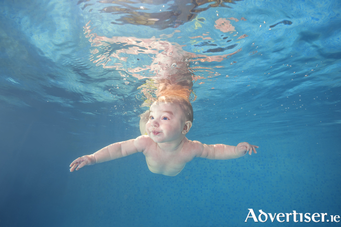 Galway Baby Swim’s approach ensures that babies grow up feeling completely at ease in the water, “as if they have always known how to swim”. Photo: iStock. 