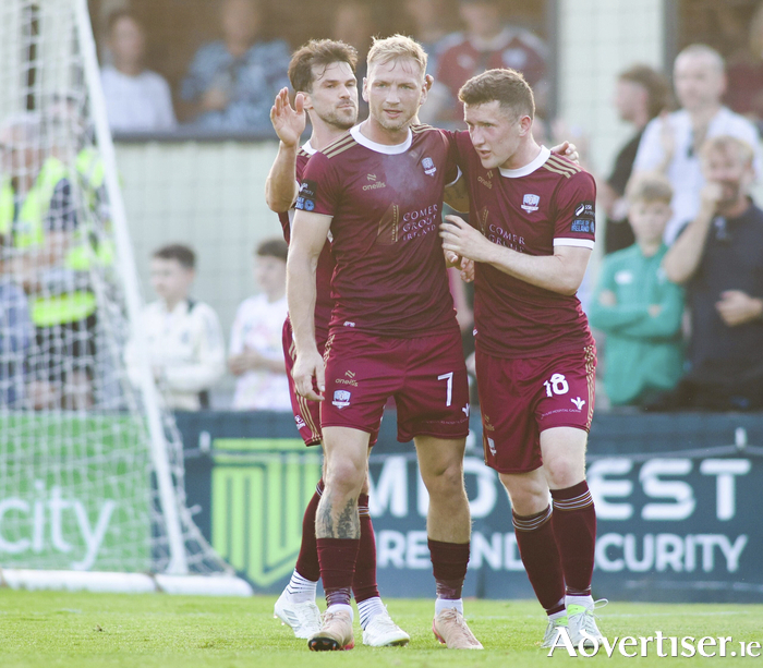 Galway United’s Stephen Walsh is congratulated by team-mates Bobby Burns and Jimmy Keohane after scoring against Salthill Devon in the Sports Direct FAI Cup game at Eamonn Deacy Park last Friday night.  (Photo: Mike Shaughnessy)