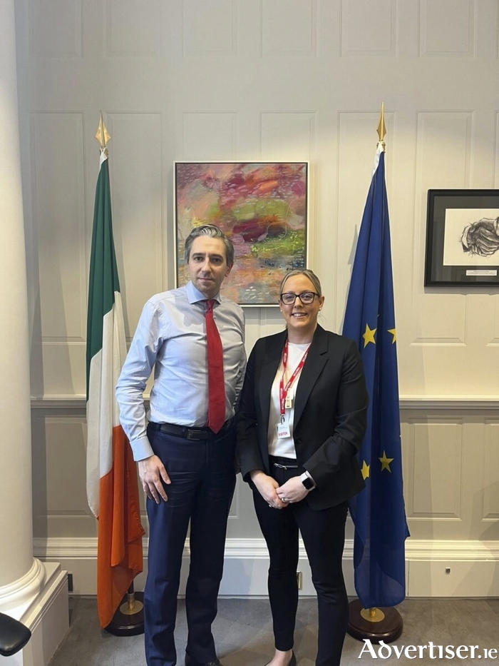 Tanaiste Simon Harris with Niamh Madden