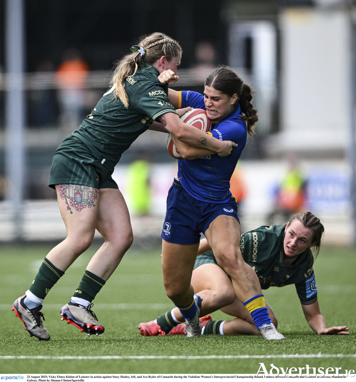Vicky Elmes Kinlan of Leinster in action against Stacy Hanley, left, and Ava Ryder of Connacht during the Vodafone Women's Interprovincial Championship Round 3 match between Connacht and Leinster at Dexcom Stadium in Galway. (Photo by Shauna Clinton/Sportsfile)