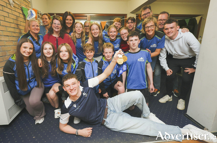 John Shortt with members of the Bluefin Swim Team at the homecoming celebrations hosted by Corinthians Rugby Club for John Shortt, World Junior Swimming Champion on Monday night at Corinthian Park, Cloonacauneen. (Photo: Mike Shaughnessy)