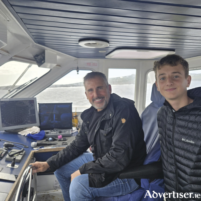Steve Carell took the helm and posed with Doolin Ferry's owner Liam O'Brien's son Connor.