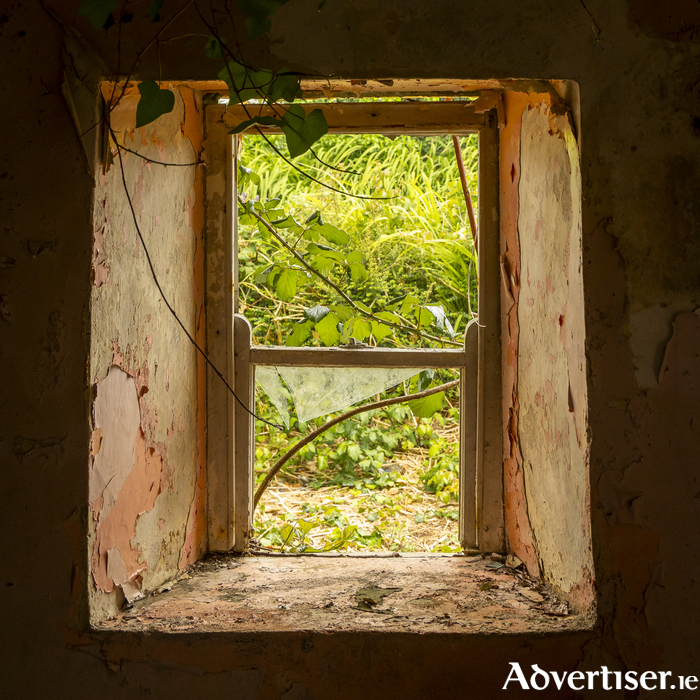 Window of a derelict cottage. Photo: iStock. 