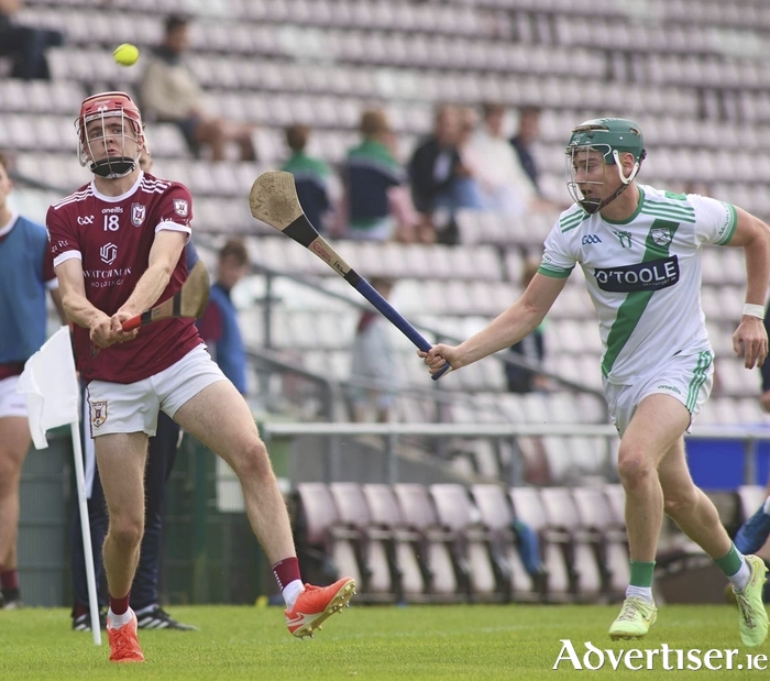 Athenry's Matthew Feeney and Moycullen's Fiachra McDonagh in action from the Frovis Mazars Galway Senior Club Championship game at Pearse Stadium in August. (Photo: Mike Shaughnessy)