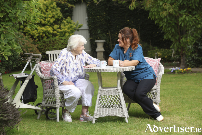 Nicole Merriman with client Fionnuala Liddy, pictured as Right at Home launches a major nationwide recruitment campaign.