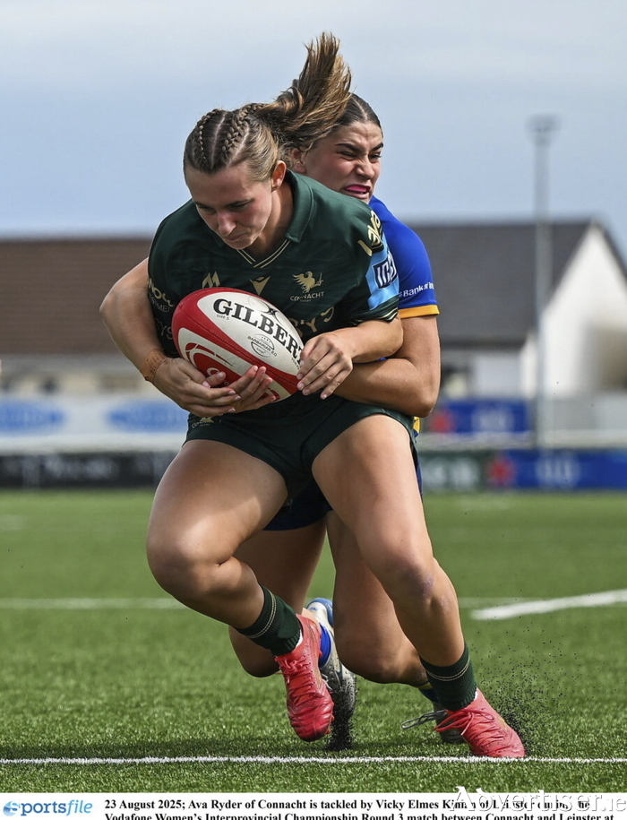 Ava Ryder of Connacht is tackled by Vicky Elmes Kinlan of Leinster during the Vodafone Womens Interprovincial Championship Round 3 match between Connacht and Leinster at Dexcom Stadium in Galway.