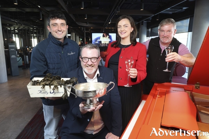 The Radisson Red Hotel hosted a reception for World Oyster Opening Championship competitors this week. Pictured (L-R) Michael Kelly of Kelly Oysters, City Cllr Niall McNelis, Clodagh Carey, Radisson Red, and Noel Holland of Galway Bay Seafood. (Photo: Mike Shaughnessy)