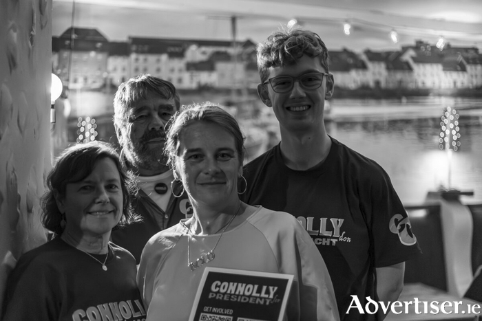 City councillor Eibhlín Seoighthe (Ind) with Catherine Connolly supporters in branded shirts after a fundraiser last week