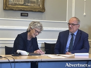 Independent presidential election candidate and Galway West TD Catherine Connolly pictured signing her nomination papers at the Custom House on Tuesday. The campaign proper got underway last evening when the lineup of three candidates was confirmed by the deadline. Polling takes place on Friday October 24.