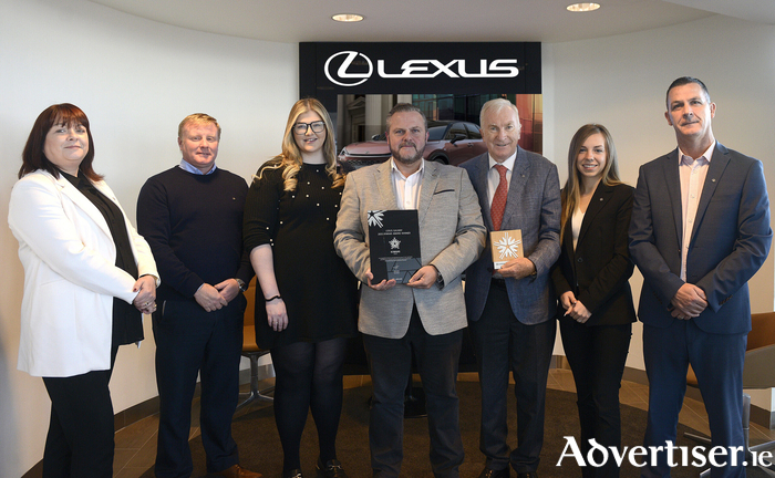 (L-R) Aine Tierney, Lexus Host, Eamonn Carty, Aftersales Manager, Fiona Heneghan, Service Advisor, Enda Brennan, Sales Manager, Tony Burke, Dealer Principal, Inga Juozunaite, Business Manager, James Ryan, Sales Executive.