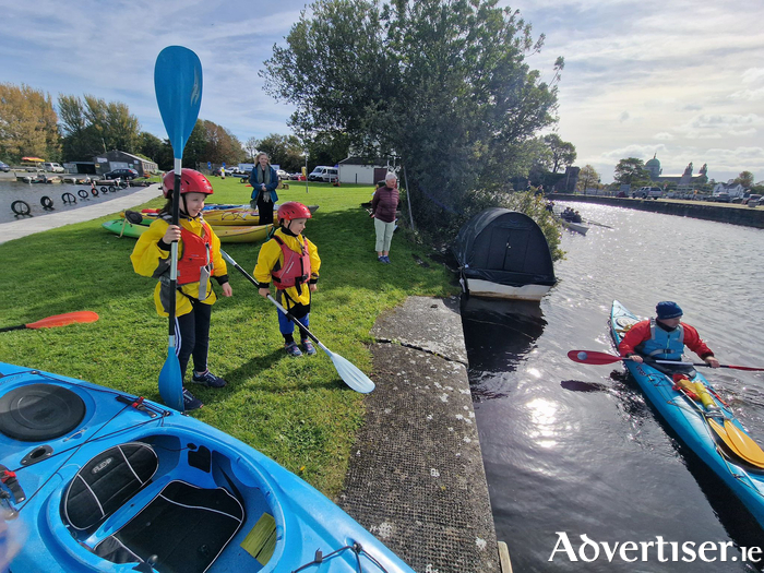 Ellen and Austin sampling the Corrib Blueway with Kayaks at Steamers Quay