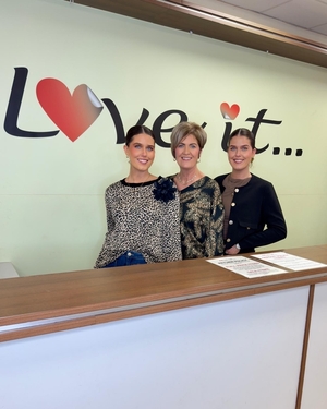 Ger Coady and her identical twin daughters, Sarah and Hannah.