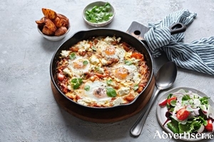 Baked eggs with feta and harissa tomato sauce.