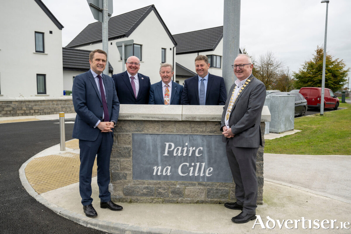 Pictured at the official opening the 29-unit Pairc na Cille social housing development in Tuam, County Galway (left to right) James Browne TD, Minister for Housing, Local Government and Heritage; Liam Conneally, Chief Executive of Galway County Council; Minister of State Seán Canney TD; Damien Mitchell, Director of Services with Galway County Council; and Cllr David Collins, Cathaoirleach of Galway County Council. Credit Andrew Downes / XPOSURE.