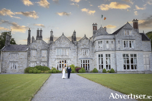 Newlyweds Cl&iacute;odhna and Cathal pose for photos outside Lough Rynn Castle. Photo: Gary Barrett Photography.