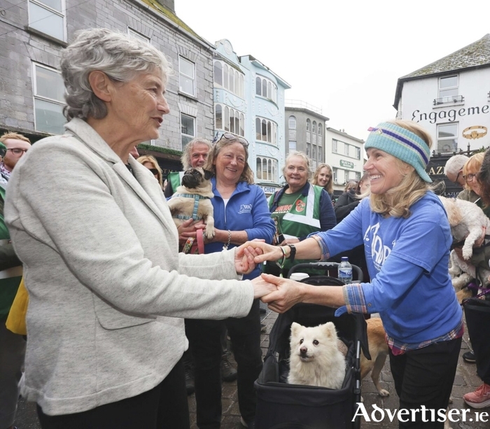 Presidential Election candidate Catherine Connolly, TD with Sharon Shannon, Madra Dog Shelter ambassador in Galway on Sunday. Photo: Mike Shaughnessy