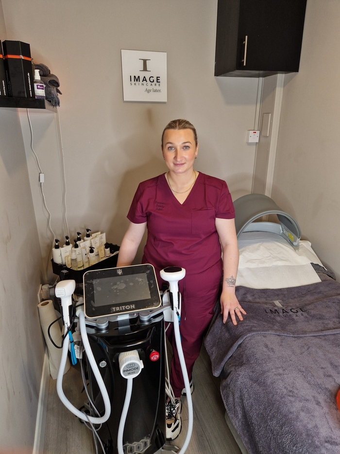 Owner of Shannon's Beauty Suites, Shannon Sheerin, pictured with the new state-of-the-art InMode Triton Machine, the first to be used in the West of Ireland. 