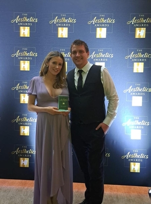 Dr. Saoire Boylan with Husband and Company Secretary, Aidan Curley, after winning best Aesthetics Doctor Connaught at the Aesthetic Awards 2025.