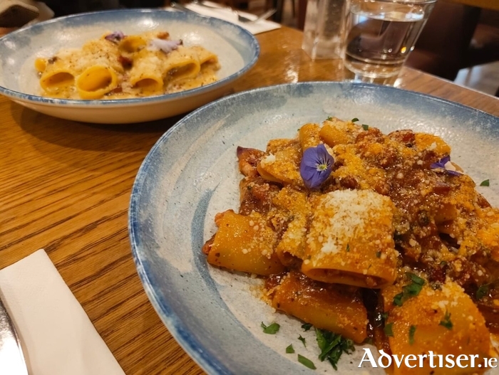 Gatto Rosso's Paccheri alla Amatriciana (front) and the Traditional Paccheri alla Carbonara.
