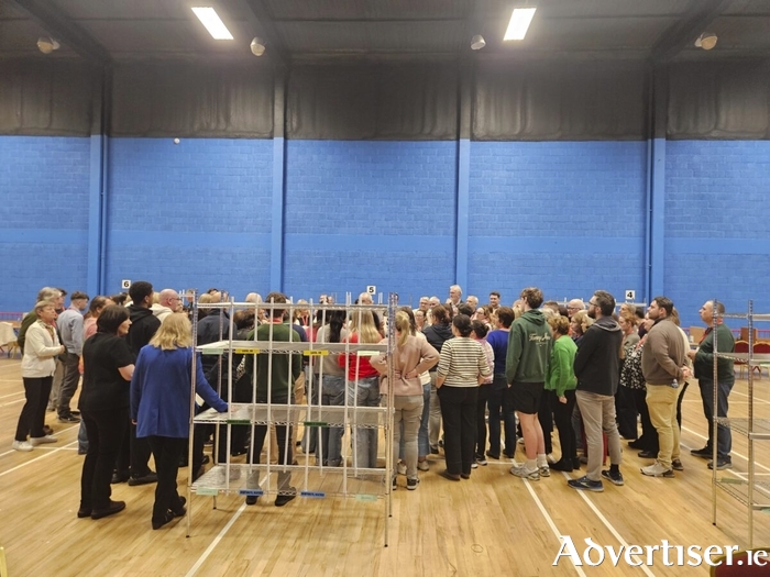 Count staff hold a meeting in Galway Lawn Tennis Club, Salthill, before sorting presidential ballots last Saturday. They will be assembled again within six months for a by-election. (Photo: Maxim Kelly)