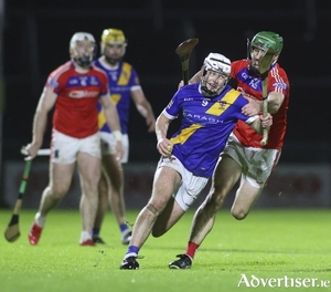Loughrea&rsquo;s Cullen Killeen and David Burke of St Thomas&rsquo; in action from the Forvis Mazars Galway Hurling Senior Club final at Pearse Stadium last Saturday night. (Photo: Mike Shaughnessy)