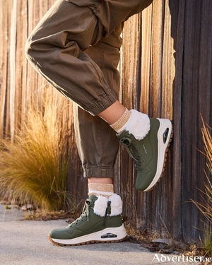 The Skechers Uno Rugged boot blends practical durability with contemporary flair.