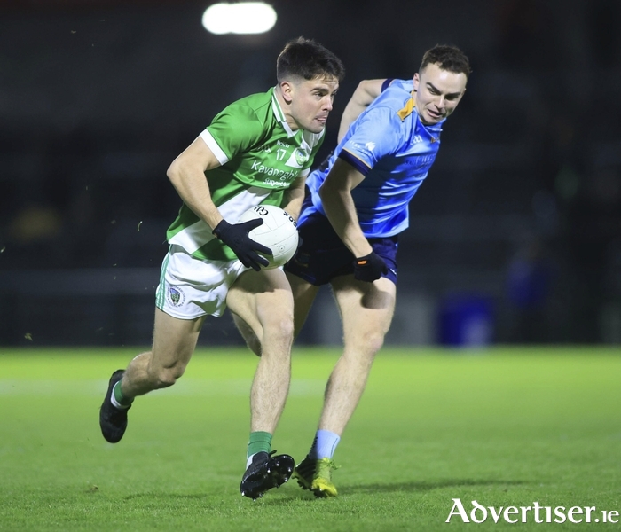Goal scorer, Sean Kelly goes on the attack for Maigh Cuilinn, chased by Salthill Knocknacarra’s Daniel O’Flaherty in action from the Bon Secours Hospital Senior Football Championship Final at Pearse Stadium. (Photo: Mike Shaughnessy)
