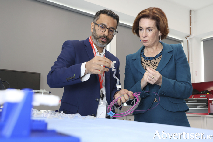 Pictured are: Minister Hildegarde Naughton TD with Mahmood Mirza, Medical Director, J&J MedTech Neurovascular.