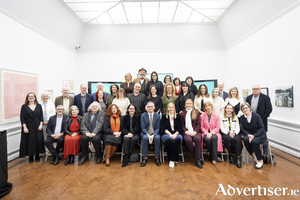 Minister for Culture, Communications and Sport: Patrick O&#039;Donovan, TD (seated centre) with representatives of the Arts Council and local authority arts offices, including Galway County Arts Officer Sharon O&#039;Grady (seated 5th from left) and retired Arts Officer James Harrold (seated 3rd from left). Credit Don Moloney.