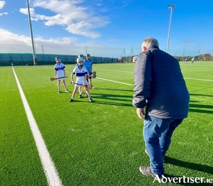 Chairperson, Sean Greene, throwing in the sliotar at the first ever game on Oranmore Maree GAA&rsquo;s new 4G Astro Pitch in a match between the club&rsquo;s U11 hurlers and St Vincents from Dublin.