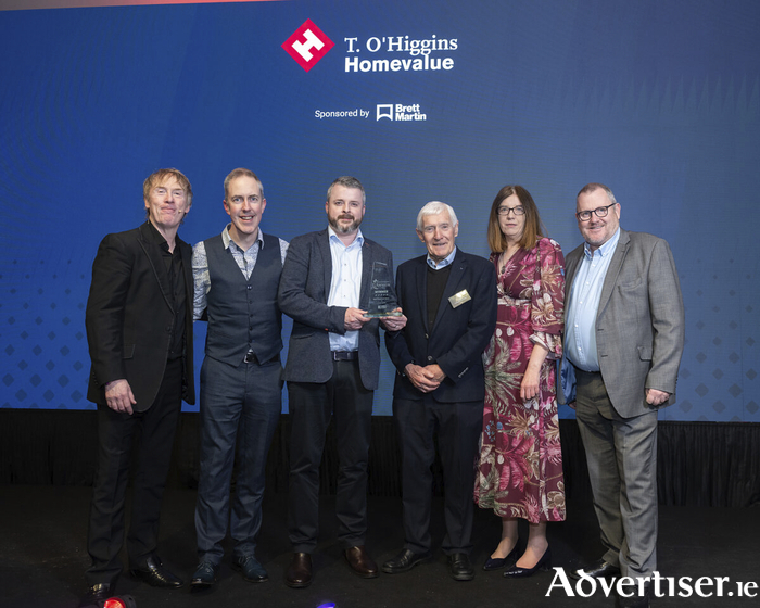 T. O’Higgin’s Homevalue’s team celebrating their win [L-R: Hector Ó hEochagáin, Fergus McKiernan, Paul O'Shaughnessy, Michael O'Higgins, Martina Carr & Glenn Goodman from Brett Martin.