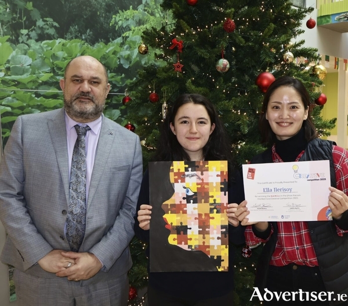 Pictured is national art winner Ella Ilerisoy with her Art teacher Sinhye Park and Principal John Cleary.