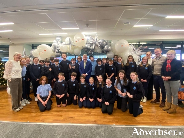 Rang a 6 students, Príomhoide Áine Ní Thuathail, Múinteoir Rang a 6: Aonghus Ó hEochaidh along with Joyce Muhschlegel (Coiste Sábháilteachta na bhForbacha) and Bríd Uí Chualáin (Scoil na BhForbacha) at the awards ceremony in Croke Park yesterday.