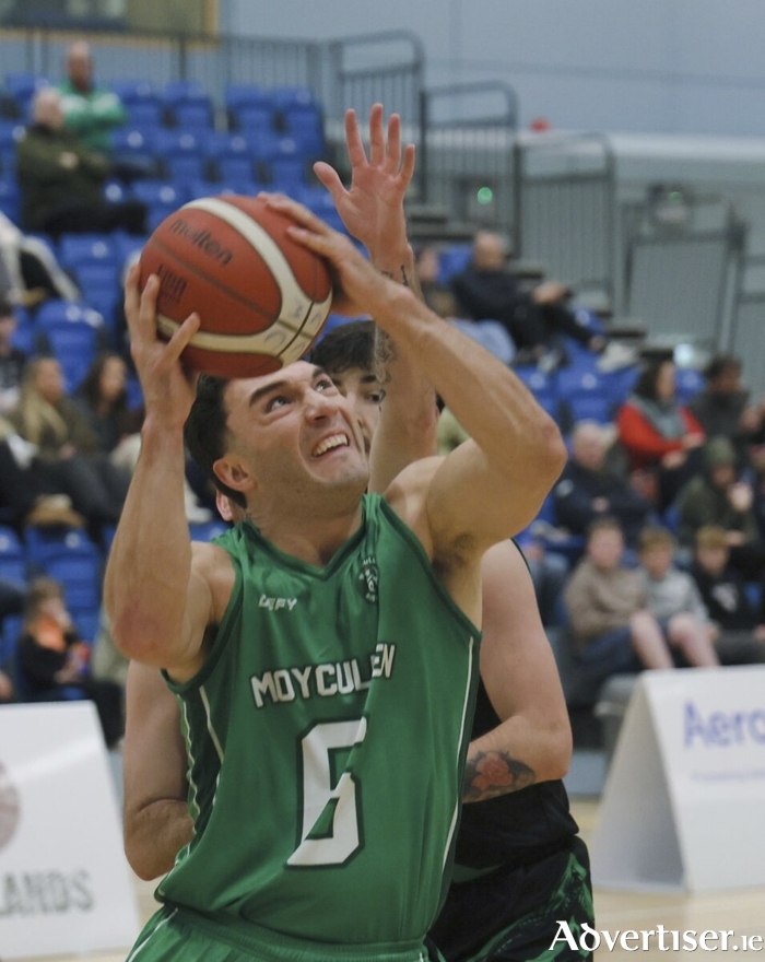 Mhaigh Cuilinn&rsquo;s Grant Olsson under pressure from Michael Wallace of Portlaoise Panthers in action from the Basketball Ireland Domino&rsquo;s Division 1 National League game at the Kingfisher Sports Centre last month. (Photo: Mike Shaughnessy)