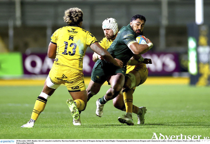 Bundee Aki of Connacht is tackled by Harrison Keddie and Fine Inisi of Dragons during the United Rugby Championship match between Dragons and Connacht at Rodney Parade in Newport, Wales. 
(Photo by Chris Fairweather/Sportsfile)