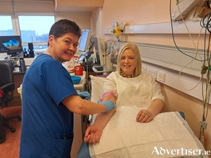 Andrea Salzer, phlebotomist and Eva Lally.