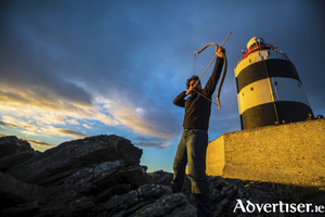 Joszef Sztana from Hungary pictured at Hook Lighthouse during last year's arrow ceremony, a tradition dating back to 1687. Photo: Patrick Browne.
