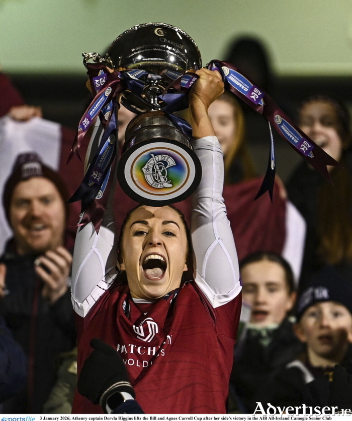Athenry captain Dervla Higgins lifts the Bill and Agnes Carroll Cup after her side's victory in the AIB All-Ireland Camogie Senior Club Championship final replay match between Athenry of Galway and St Finbarr's of Cork at FBD Semple Stadium in Thurles, Tipperary. (Photo by Ben McShane/Sportsfile)