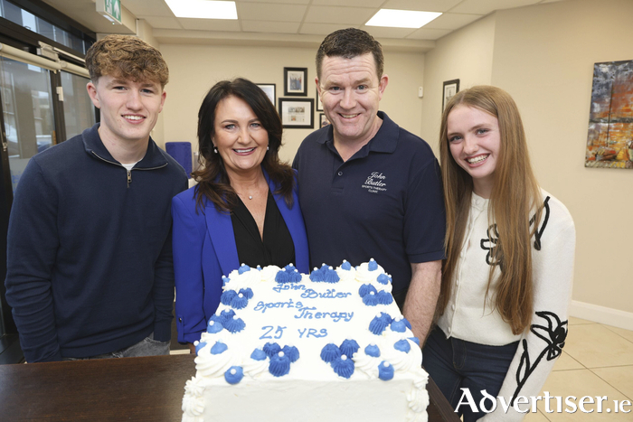 The Butler family, Sean, Mary, John and Amy Butler, celebrating 25 years of John Butler Sports Therapy Clinic. Photo: Mike Shaughnessy