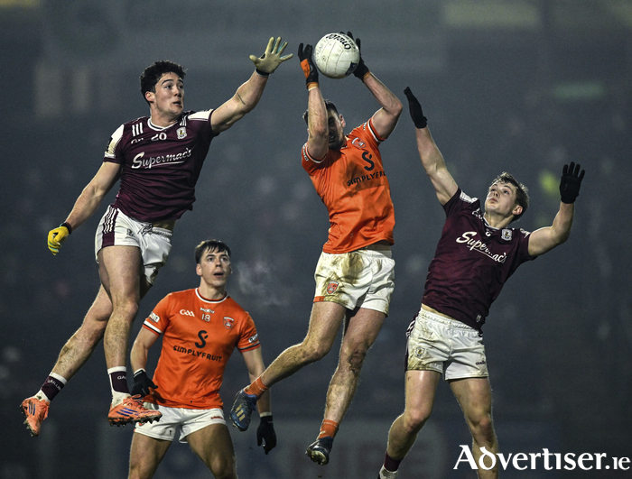 Greg McCabe of Armagh wins possession ahead of Shay McGlinchey and Johnny  McGrath of Galway during the Allianz Football League Division 1 match between Armagh and Galway at BOX-IT Athletic Grounds, Armagh. 
 (Photo by Ray McManus/Sportsfile)