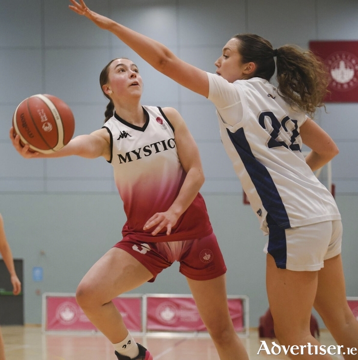 University of Galway Mystics&rsquo; Karolina Gierszal and Charley McGrath of Cleveland Rockets in action from the Basketball Ireland Domino&rsquo;s Women's Division 1 game at the Kingfisher on Saturday. (Photo: Mike Shaughnessy)