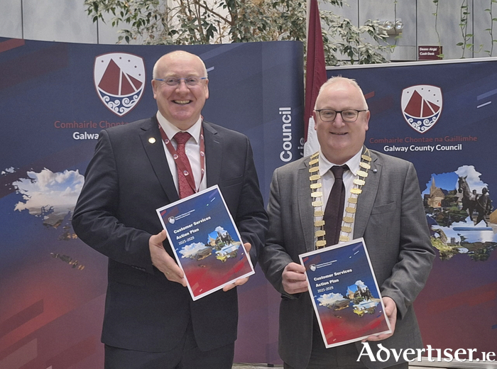 On right is Cllr David Collins, Cathaoirleach of the County of Galway, and Chief Executive Liam Conneally pictured with a copy of the Galway County Council Customer Services Action Plan.