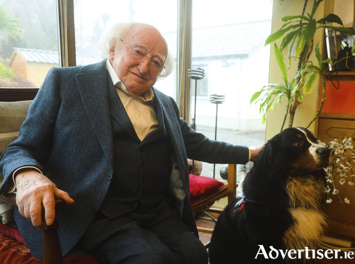 Michael D Higgins at home with Misneach. 