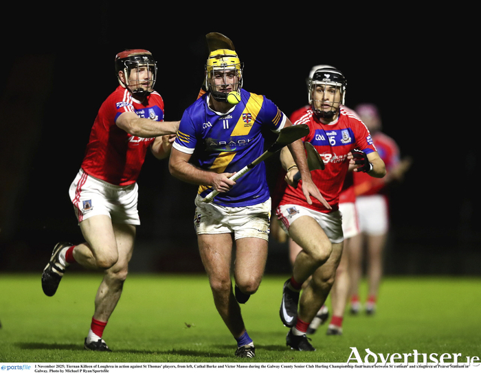 Tiernan Killeen of Loughrea in action against St Thomas' players, from left, Cathal Burke and Victor Manso during the Galway County Senior Club Hurling Championship final match between St Thomas' and Loughrea at Pearse Stadium in Galway. (Photo by Michael P Ryan/Sportsfile)