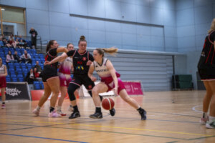 University of Galway Mystics&rsquo; Kara McCleane drives past Moy Tolka Rovers&rsquo; Dane Bertolina during the Domino&rsquo;s Women's Division One League fixture on Saturday, 28 February 2026, at Kingfisher University of Galway. (Photo: Olivia Sasse)