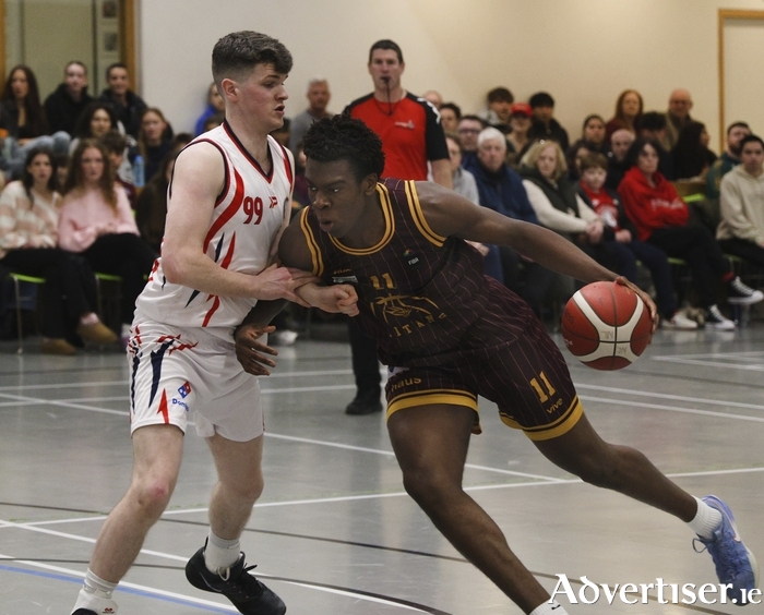 Titan&rsquo;s Declan Gbinigie and Templeogue&rsquo;s Michael Gormley in action from the Basketball Ireland Domino&rsquo;s Division One league game at Ballinfoile Castlegar Neighbour Centre on Saturday evening. (Photo: Mike Shaughnessy)